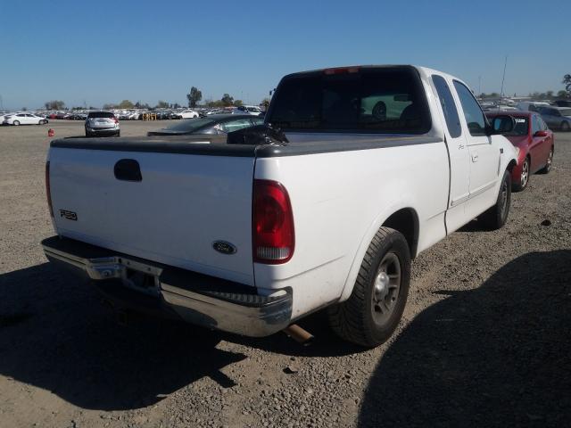 Photo 4 from auction – 2000 FORD F150 with VIN 1FTRX17L5YKA95809