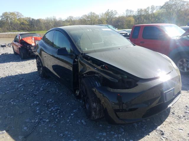 TESLA MODEL Y 2021 with VIN 5YJYGDEF7MF083985 - Photo from auction