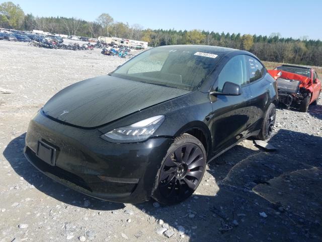 Photo 2 from auction – 2021 TESLA MODEL Y with VIN 5YJYGDEF7MF083985