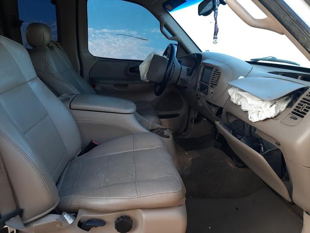 Photo 5 from auction – 2002 FORD F150 with VIN 1FTRX18L72NA07539