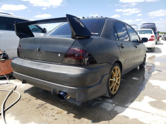Photo 4 from auction – 2002 MITSUBISHI LANCER ES with VIN JA3AJ26E82U039722