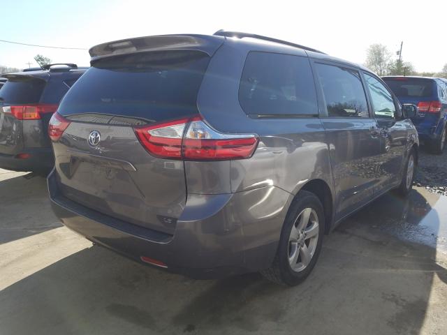Photo 4 from auction – 2015 TOYOTA SIENNA LE with VIN 5TDKK3DC2FS561461
