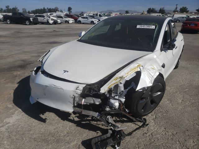 Photo 9 from auction – 2021 TESLA MODEL 3 with VIN 5YJ3E1EA9MF868088