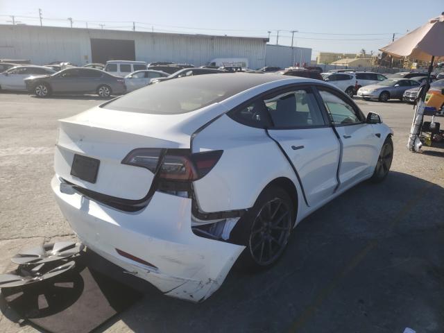 Photo 4 from auction – 2021 TESLA MODEL 3 with VIN 5YJ3E1EA9MF868088