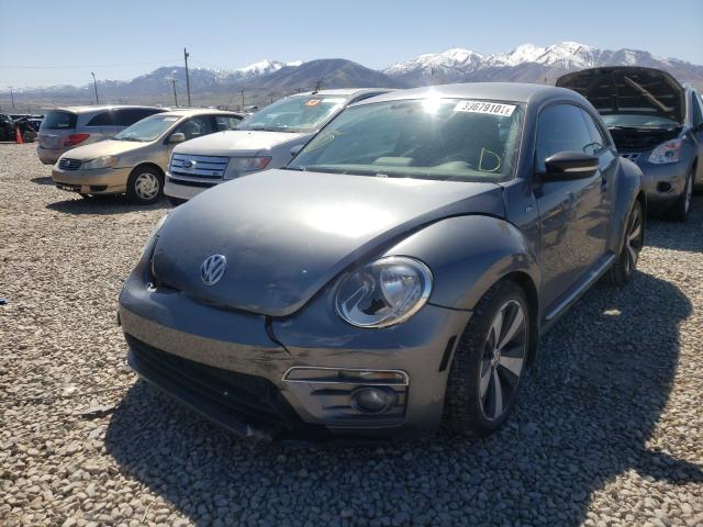 Photo 2 from auction – 2014 VOLKSWAGEN BEETLE TUR with VIN 3VWVS7AT8EM605614
