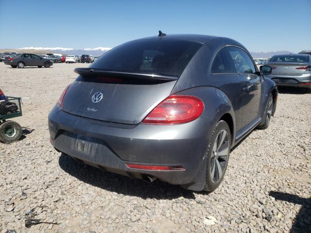 Photo 4 from auction – 2014 VOLKSWAGEN BEETLE TUR with VIN 3VWVS7AT8EM605614