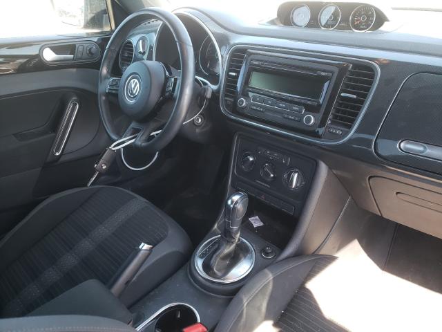 Photo 9 from auction – 2014 VOLKSWAGEN BEETLE TUR with VIN 3VWVS7AT8EM605614