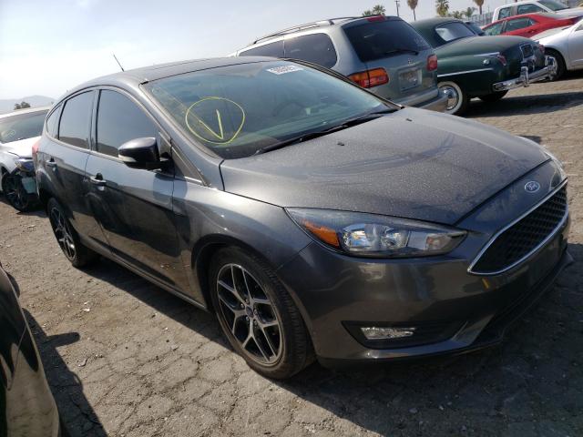 FORD FOCUS SEL 2017 with VIN 1FADP3M29HL219985 - Photo from auction
