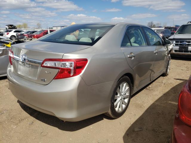 Photo 4 from auction – 2014 TOYOTA CAMRY HYBR with VIN 4T1BD1FK0EU109422