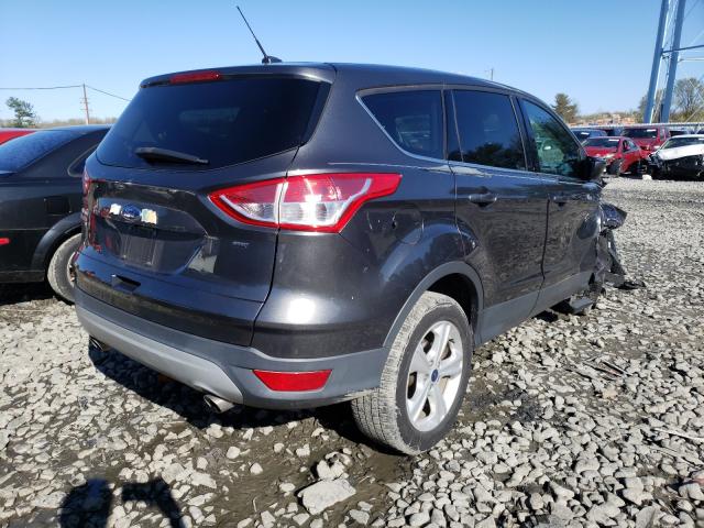 Photo 4 from auction – 2016 FORD ESCAPE SE with VIN 1FMCU0G74GUC72313