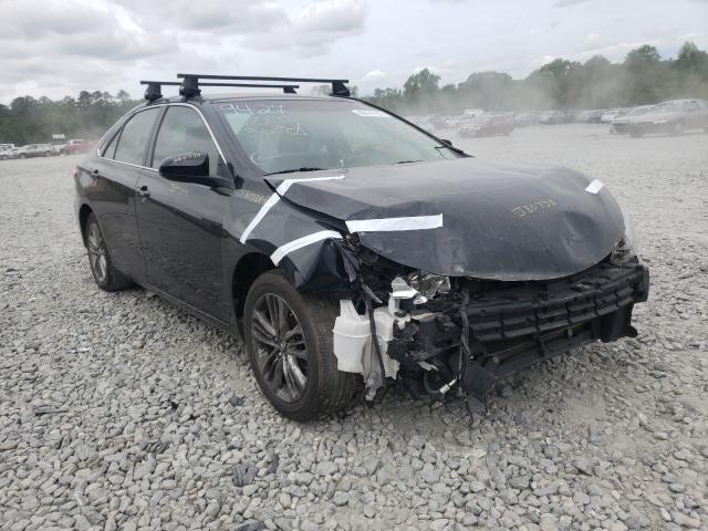 TOYOTA CAMRY LE 2017 with VIN 4T1BF1FK2HU699427 - Photo from auction