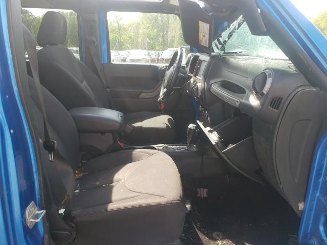 Photo 5 from auction – 2015 JEEP WRANGLER U with VIN 1C4BJWDG6FL589286