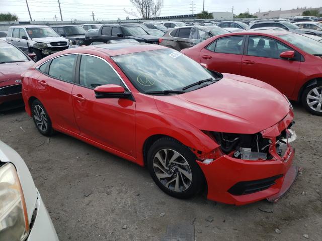 HONDA CIVIC EX 2018 with VIN 2HGFC2F79JH604467 - Photo from auction