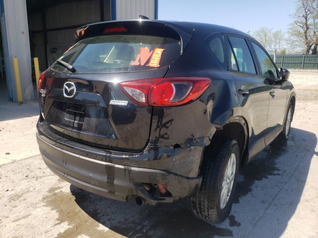Photo 9 from auction – 2013 MAZDA CX-5 SPORT with VIN JM3KE4BE0D0106214