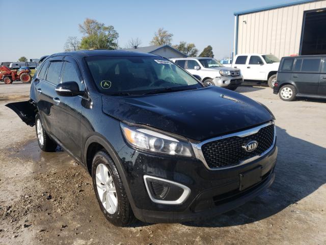KIA SORENTO LX 2018 with VIN 5XYPG4A31JG425815 - Photo from auction