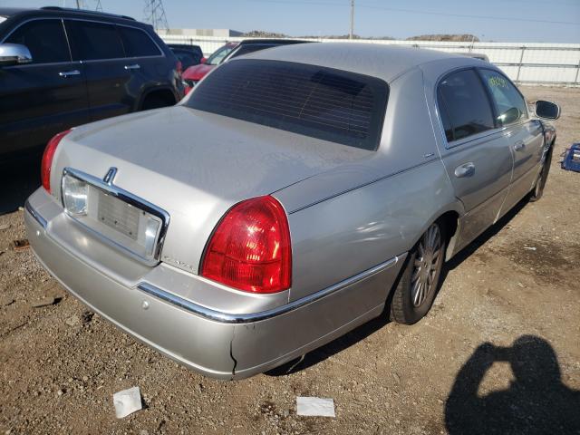 Photo 4 from auction – 2004 LINCOLN TOWN CAR U with VIN 1LNHM83W64Y657281