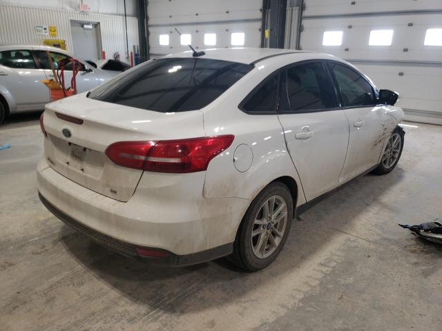 Photo 4 from auction – 2018 FORD FOCUS SE with VIN 1FADP3F27JL206168