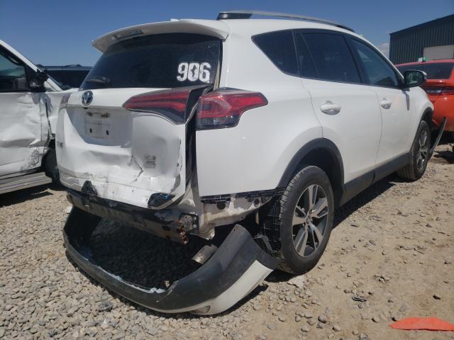 Photo 4 from auction – 2016 TOYOTA RAV4 XLE with VIN 2T3RFREV4GW487076