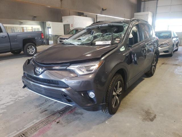 Photo 2 from auction – 2017 TOYOTA RAV4 XLE with VIN JTMRFREVXHJ145082