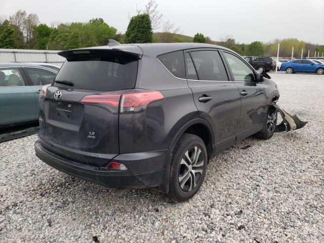Photo 4 from auction – 2017 TOYOTA RAV4 LE with VIN JTMBFREV0HJ711798
