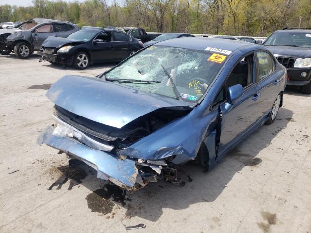 Photo 2 from auction – 2011 HONDA CIVIC LX with VIN 19XFA1F56BE040139