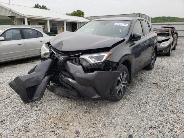 Photo 2 from auction – 2017 TOYOTA RAV4 LE with VIN JTMBFREV0HJ711798