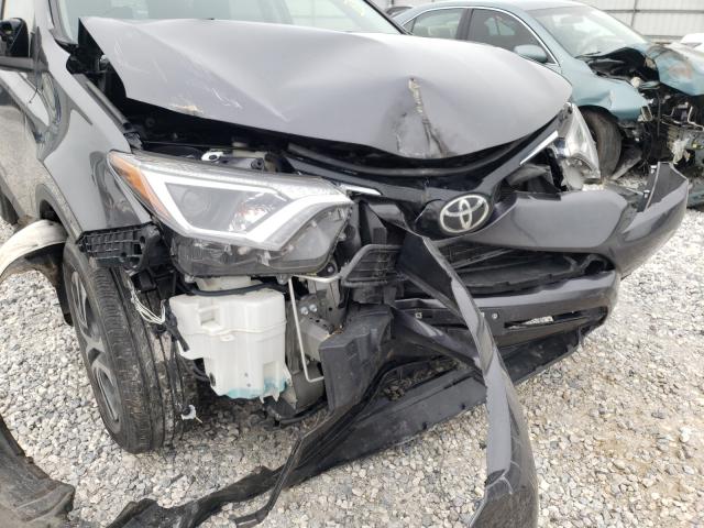 Photo 9 from auction – 2017 TOYOTA RAV4 LE with VIN JTMBFREV0HJ711798