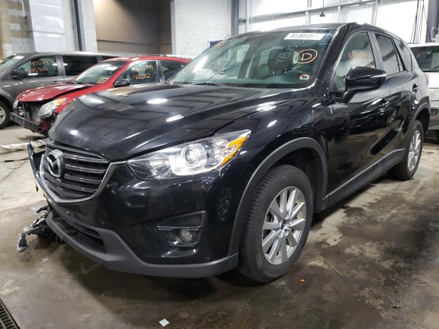 Photo 2 from auction – 2016 MAZDA CX-5 TOURI with VIN JM3KE4CY3G0717867