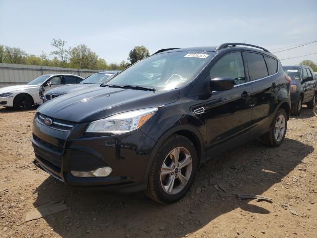 Photo 2 from auction – 2016 FORD ESCAPE SE with VIN 1FMCU9GX3GUC48749