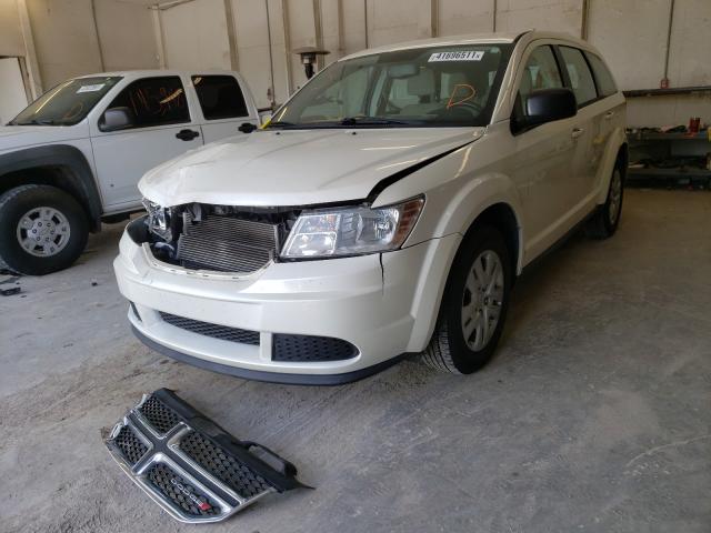 Photo 2 from auction – 2013 DODGE JOURNEY SE with VIN 3C4PDCABXDT675688