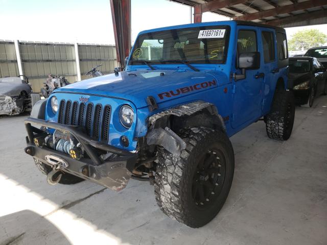 Photo 2 from auction – 2012 JEEP WRANGLER U with VIN 1C4BJWFGXCL159804