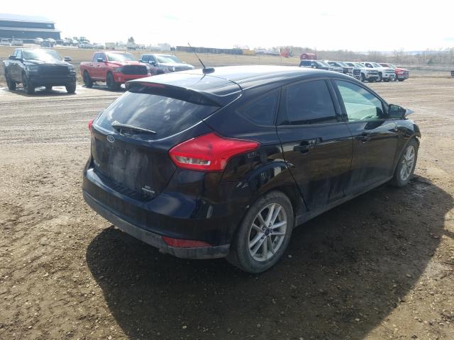 Photo 4 from auction – 2016 FORD FOCUS SE with VIN 1FADP3K21GL200431