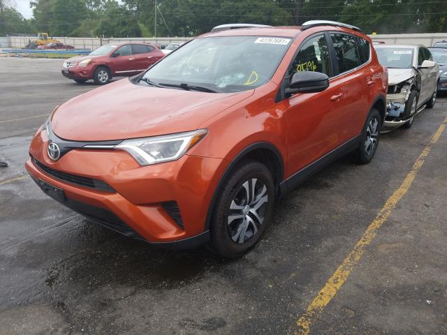 Photo 2 from auction – 2016 TOYOTA RAV4 LE with VIN JTMZFREV8GD087213