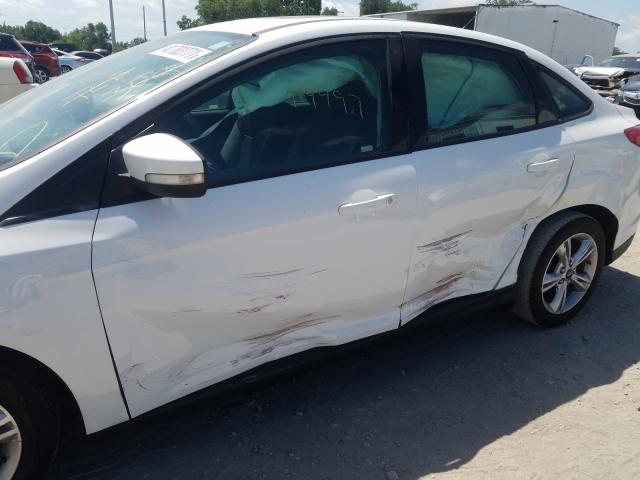 Photo 9 from auction – 2013 FORD FOCUS SE with VIN 1FADP3F2XDL162137