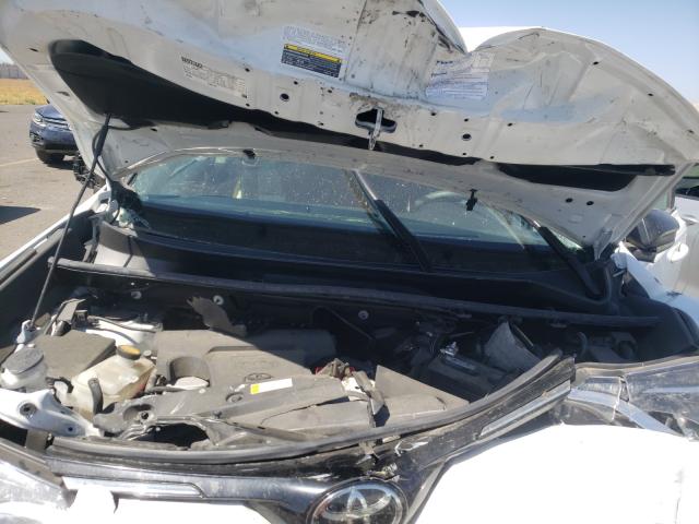 Photo 7 from auction – 2018 TOYOTA RAV4 LE with VIN 2T3ZFREV8JW507871
