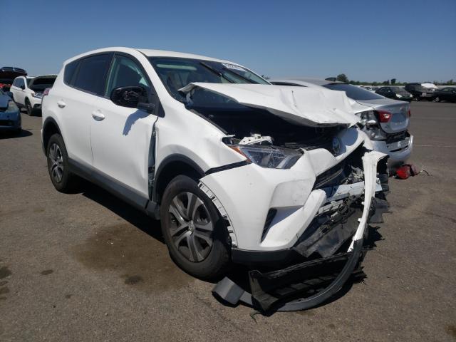 TOYOTA RAV4 LE 2018 with VIN 2T3ZFREV8JW507871 - Photo from auction