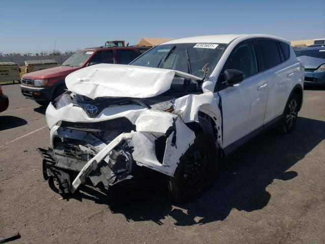 Photo 2 from auction – 2018 TOYOTA RAV4 LE with VIN 2T3ZFREV8JW507871