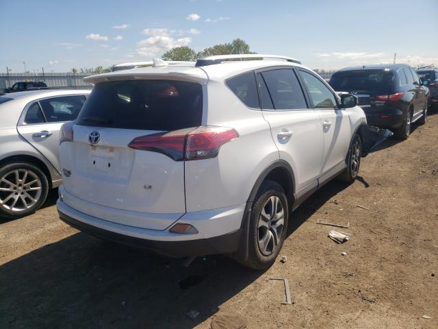 Photo 4 from auction – 2017 TOYOTA RAV4 LE with VIN JTMZFREV1HJ131166