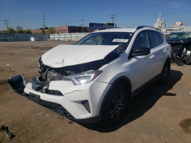 Photo 2 from auction – 2017 TOYOTA RAV4 LE with VIN JTMZFREV1HJ131166
