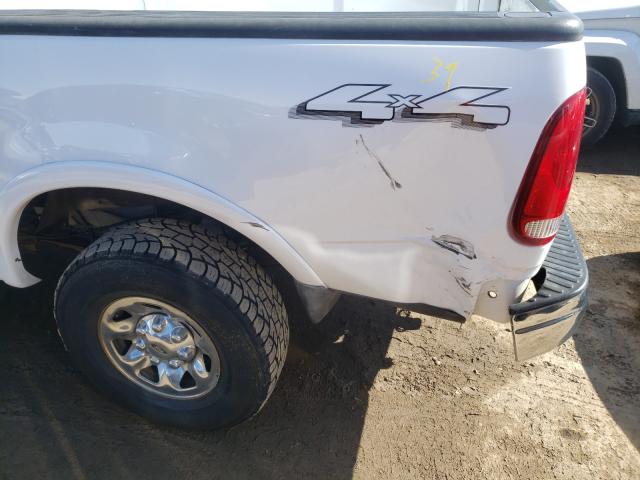 Photo 9 from auction – 2003 FORD F150 with VIN 1FTPX18LX3NA16289