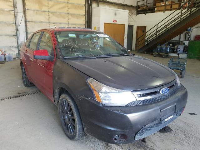 FORD FOCUS SES 2011 with VIN 1FAHP3GN5BW100067 - Photo from auction