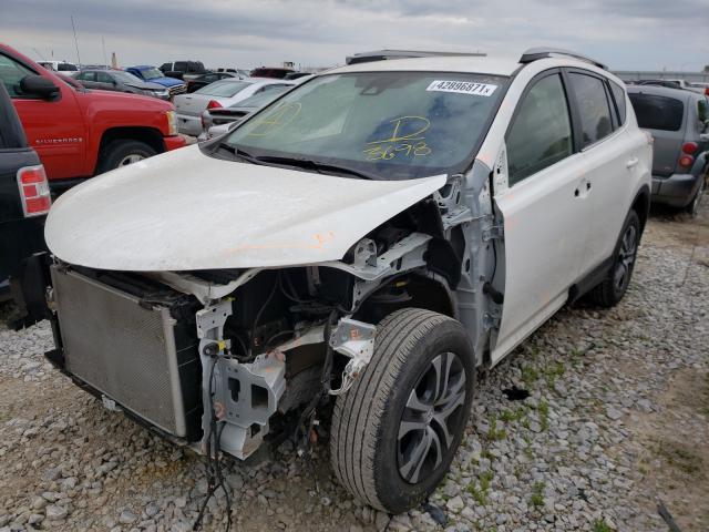 Photo 2 from auction – 2017 TOYOTA RAV4 LE with VIN JTMBFREV9HJ133698