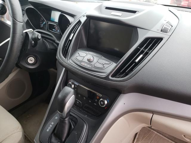 Photo 9 from auction – 2015 FORD ESCAPE SE with VIN 1FMCU9G94FUC06865