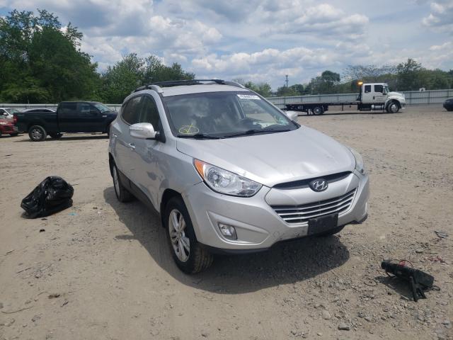 HYUNDAI TUCSON GLS 2013 with VIN KM8JUCAC3DU619141 - Photo from auction