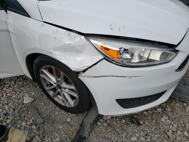 Photo 9 from auction – 2016 FORD FOCUS SE with VIN 1FADP3K29GL374716