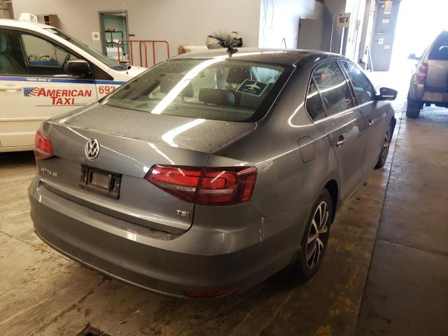 Photo 4 from auction – 2017 VOLKSWAGEN JETTA SE with VIN 3VWDB7AJ7HM243628