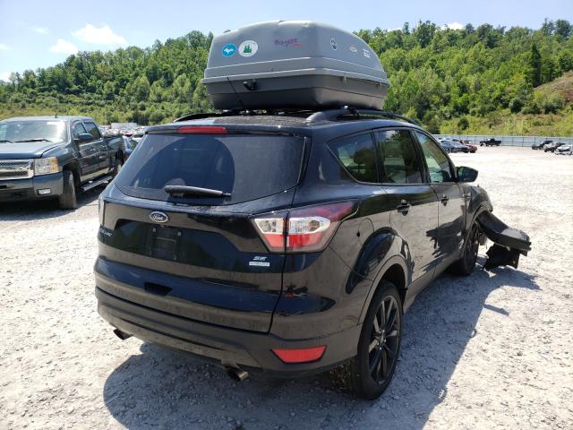 Photo 4 from auction – 2017 FORD ESCAPE SE with VIN 1FMCU0G98HUE05982