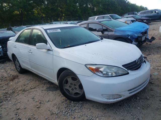 TOYOTA CAMRY LE 2002 with VIN 4T1BF32K42U007368 - Photo from auction