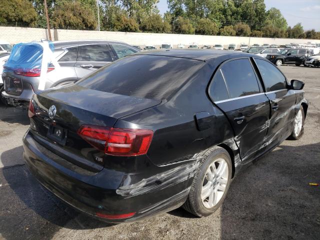 Photo 4 from auction – 2017 VOLKSWAGEN JETTA S with VIN 3VW2B7AJ0HM370860