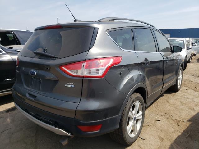 Photo 4 from auction – 2016 FORD ESCAPE SE with VIN 1FMCU9G95GUC13468